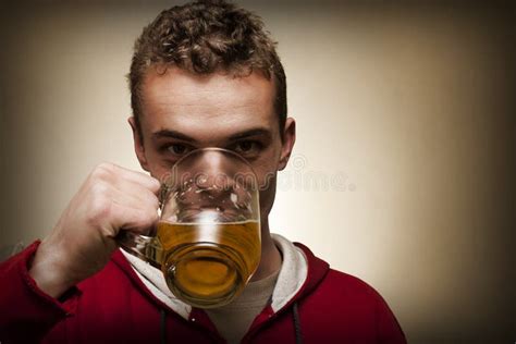 Drinking beer stock image. Image of studio, person, lager - 15542353