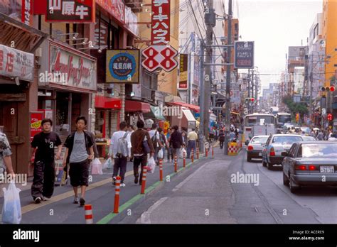 Busy Touristy Kokusaidori Street In Downtown Naha City Okinawa Stock