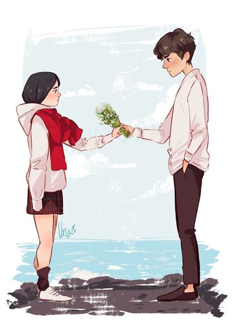 Two People Are Holding Flowers And Facing Each Other While Standing On