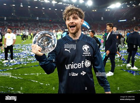 England's Tom Grennan celebrates with the player of the match award ...