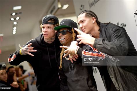 Recording Artist Lil Wayne Poses With Fans At The Neiman Marcus X