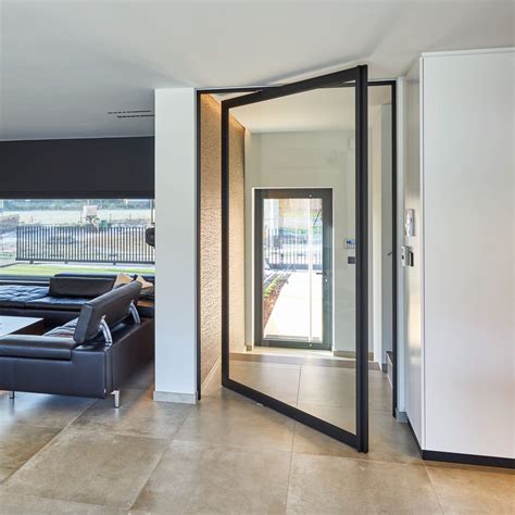 Pivoting Door With Offset Axis Aluminum Full Height Glazed