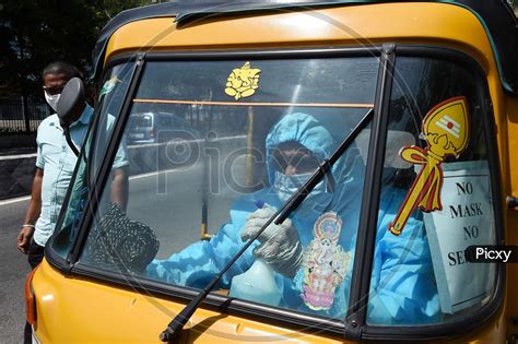 Image Of A Driver Wearing Personal Protective Equipment Ppe