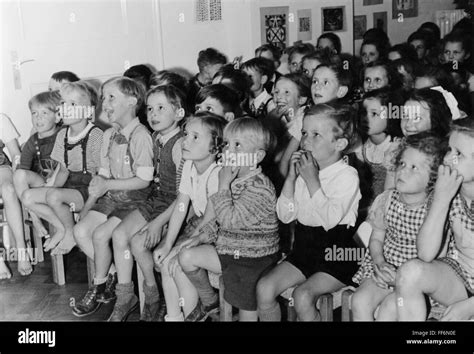 theatre / theater, audience, group of children following a performance ...