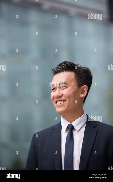 Chinese Business Man In Modern Asian City Portrait Of An Asian