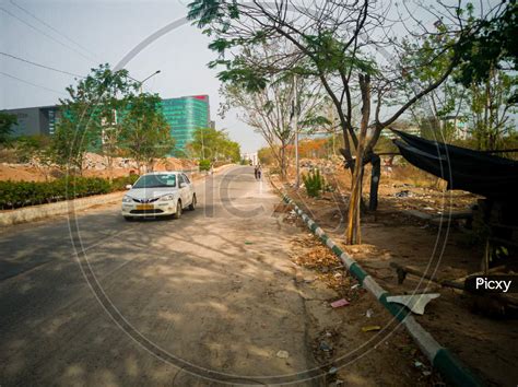 Image Of A Car Is Moving In A Empty Road As Cm Kcr Extended Lockdown In