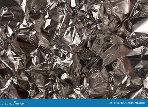 Full Frame Take Of A SheeT Of Crumpled Silver Aluminum Foil Stock Photo