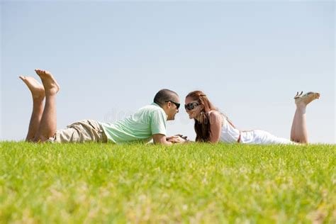 Couple Laying On Grass Near Meadow Stock Image Image Of Happiness Intimate 16049875