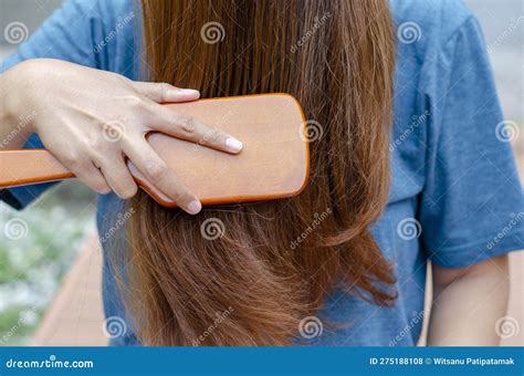 Blonde Haired Asian Woman Posing Front Combing Her Hair Stock Photo