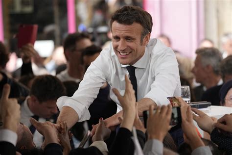 Macron in pole position, Le Pen racing hard in French presidential election | WBUR News