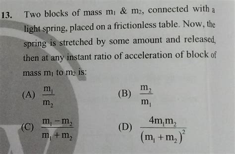 Two Blocks Of Mass M M Connected With A Light Spring Placed On A Fr