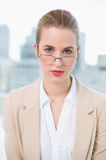 Premium Photo Serious Businesswoman With Glasses Posing