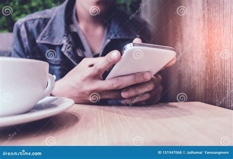 Close Up Of Man Hands Holding Touching Mobile Phone Stock Photo Image