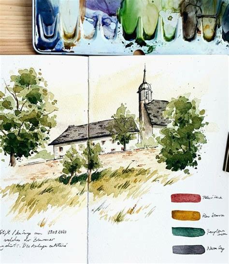 An Artist S Sketchbook With Watercolors And Ink