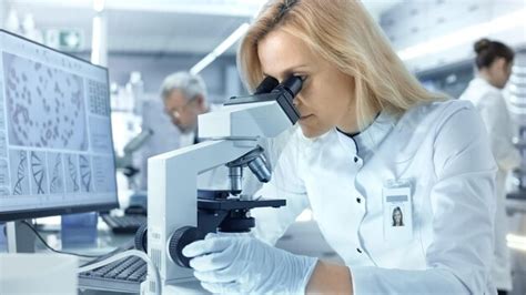 Premium Photo Female Research Scientist Looks At Biological Samples