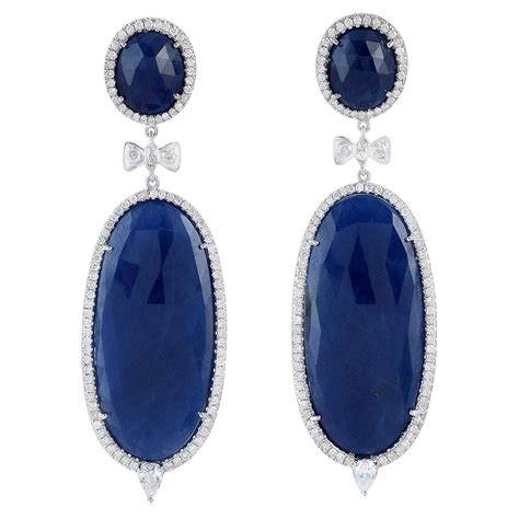 Drop Shaped Dangle Earring With Blue Sapphire And Diamonds Made In 18k