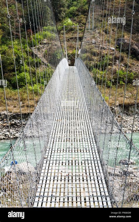 Nepal bridge hanging hi-res stock photography and images - Alamy