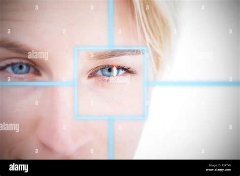 Pretty Blonde Applying Contact Lens Stock Photo Alamy
