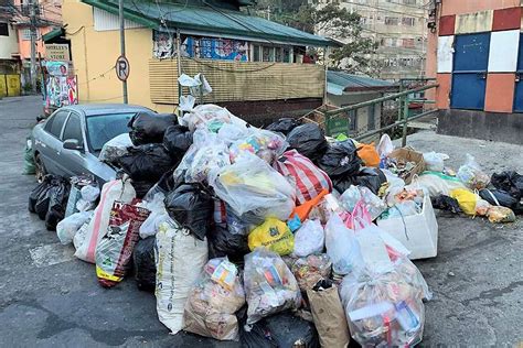 Some Parked Cars Get Buried In Trash In Baguio Photos Gma News Online