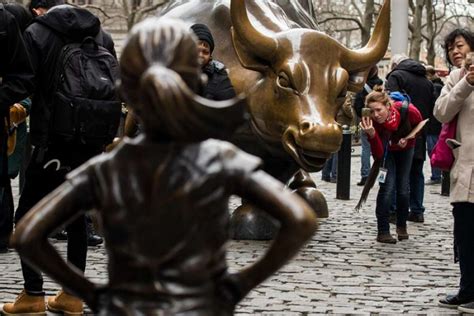 Photo Man Appears To Desecrate Fearless Girl Statue On Wall Street