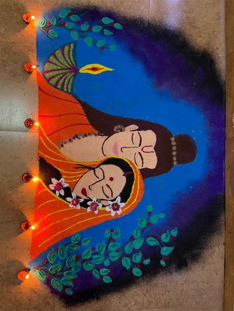 A Painting On The Ground With Lights Around It And An Image Of Two