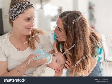 imágenes de Gay couple kisses with kids Imágenes fotos y vectores de stock Shutterstock
