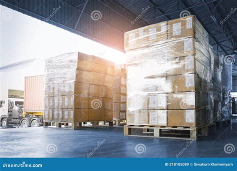 Stacked Of Package Boxes Loading Into Container Truck Truck Parked