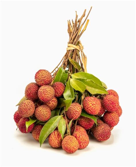 Premium Photo Fresh Lychees With Leaves Isolated On White Background