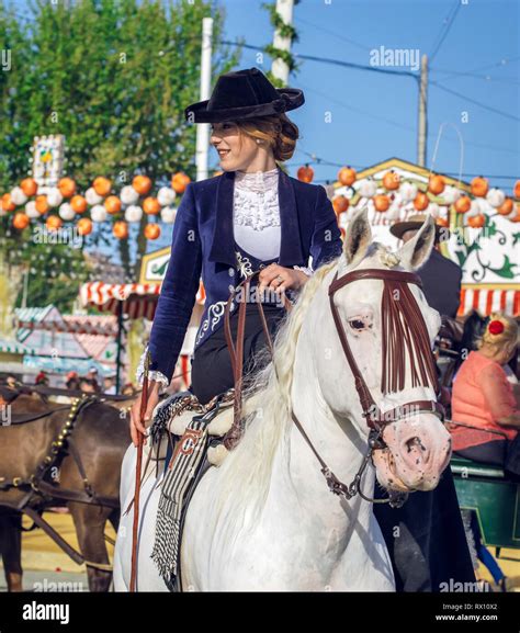 Young Beautiful and Attractive Woman riding andalusian Horse (Pure ...