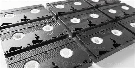 Vhs Tapes Neatly Arranged Video Home System Tape Cassette On White