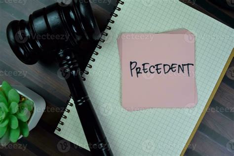 Concept Of Precedent Write On Sticky Notes With Gavel Isolated On