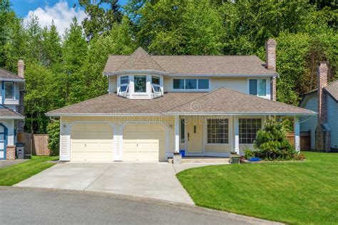 Yellow House with Beautiful Landscaping Stock Image - Image of house ...