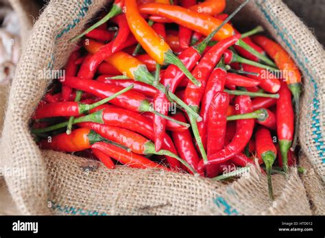 Red Hot Fresh Chili Pepper In Burlap Sack Stock Photo Alamy