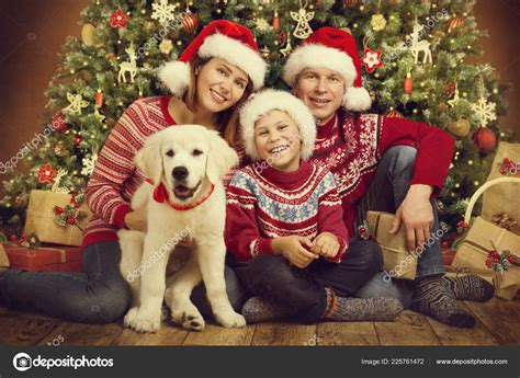 Christmas Family Dog Xmas Tree Happy Mother Father Child Portrait Stock Photo by ©inarik 225761472