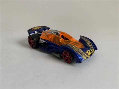 MINIATURA HOT WHEELS 1 64 LOOSE OPEN ROAD STER 2001 AZUL E LARANJA PALADINO LEILÕES
