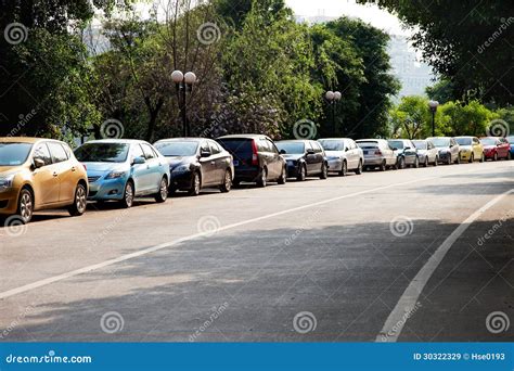 Cars Parked By The Roadside Royalty Free Stock Images Image 30322329