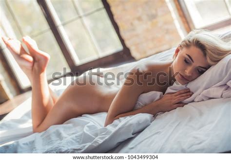 Naked Blonde Woman Lying On Bed Stock Photo Shutterstock