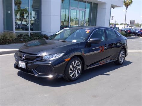 Certified Pre Owned 2018 Honda Civic Hatchback LX Hatchback In Signal