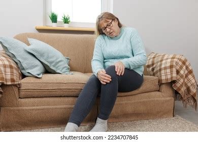 Unhealthy Mature Woman Suffering Flu Cold Stock Photo