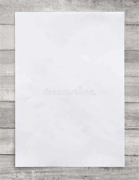 White Paper Sheet On Wood For Business Background Close Up Stock Photo