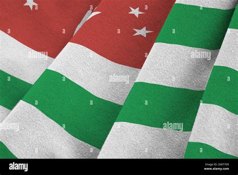 Abkhazia Flag With Big Folds Waving Close Up Under The Studio Light