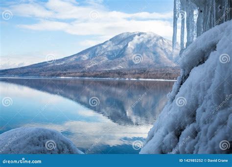 Winter Reflection of Mount Tarumae in Lake Shikotsu, Japan. Calm ...