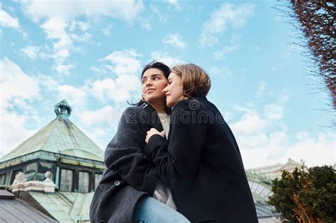 Cheerful Lesbian Couple In Outerwear Smiling Stock Image Image Of
