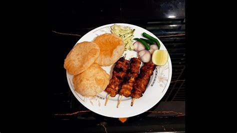 চিকেন কাঠি কাবাব ও ফুলকো লুচি রেসিপি Chicken Kathi Kabab And Fulko Luichi Recipe Rannar Swad