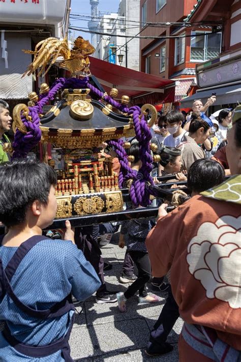 People Carrying A Portable Shrine Mikoshi At The Sanja Festival In