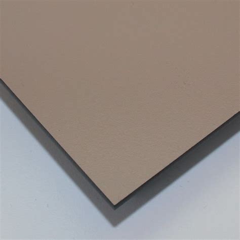 A Close Up View Of The Corner Of A Piece Of Paper On A White Surface