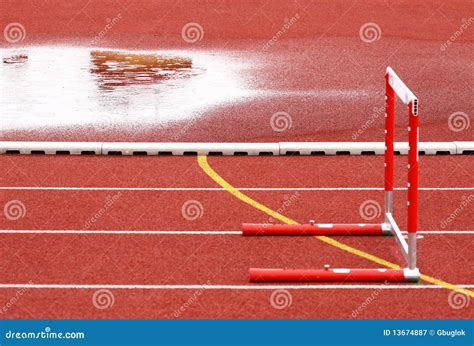 Hurdle On The Runway Stock Image Image Of Lines Puddle 13674887