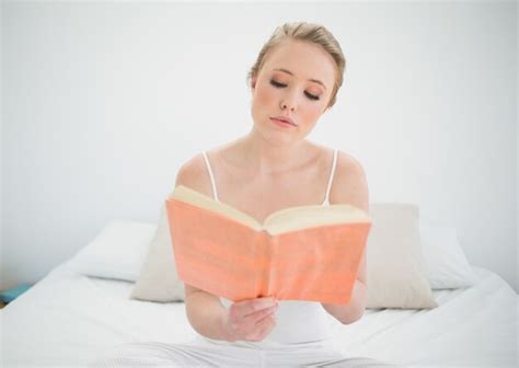 Premium Photo Natural Thoughtful Blonde Reading A Book