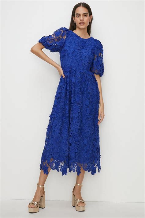 Brimming With Romance This Feminine Dress Combines Delicate Lace