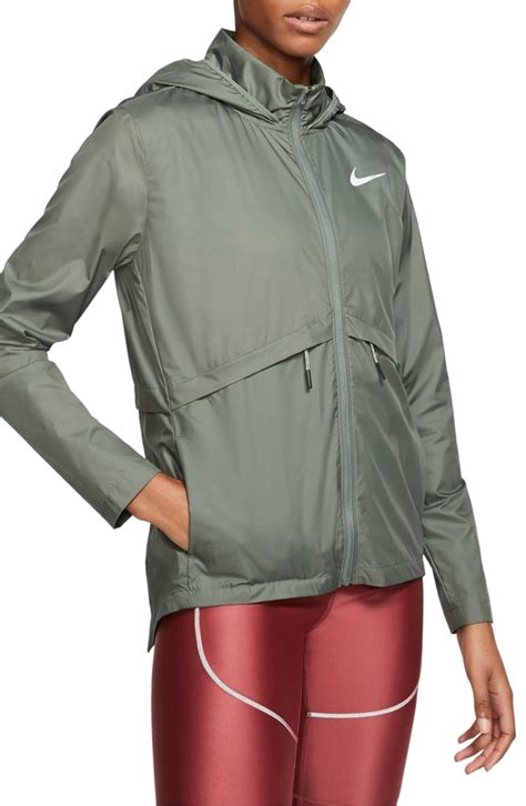 Nike Essential Water Repellent Hooded Rain Jacket | What to Bring on a ...